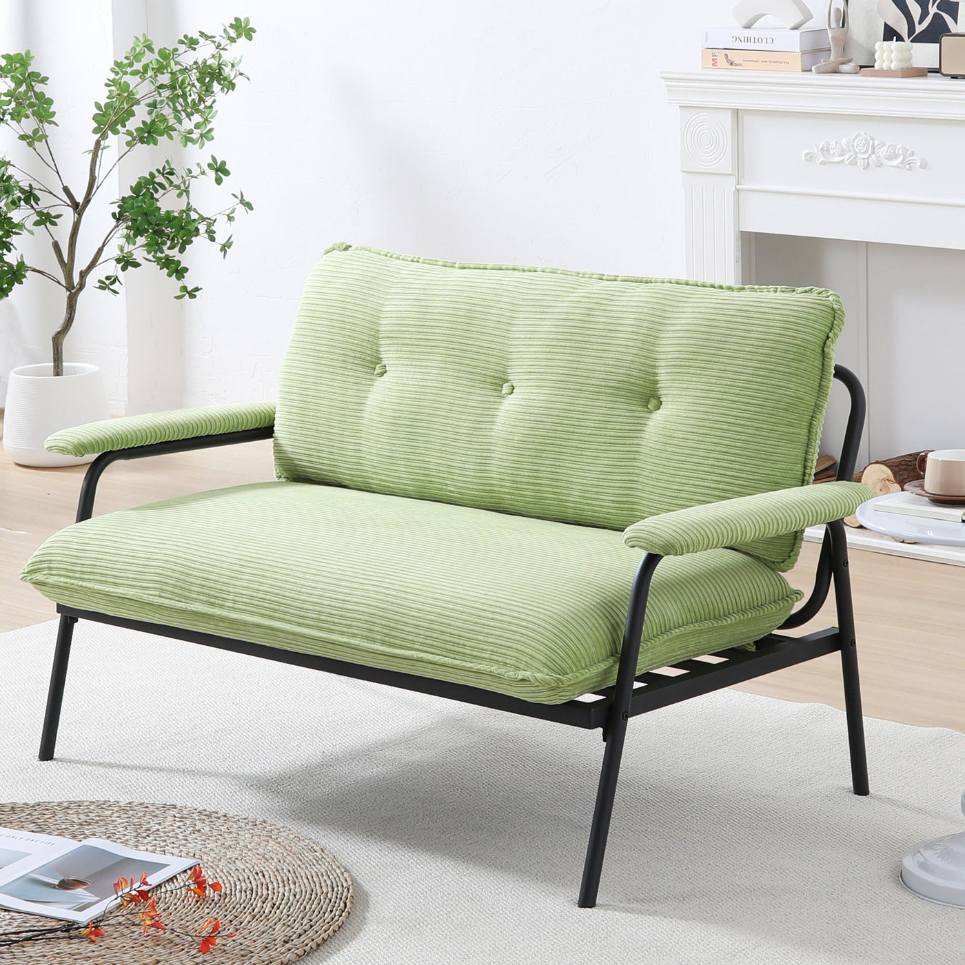 The 53-inch green sofa offers a spacious layout in the small apartment, easily handling various scenarios from watching movies to working